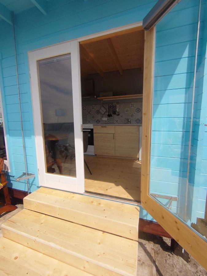 Waterhuisjes Op De Pier Van Lauwersmeerplezier! Lauwersoog Exterior foto